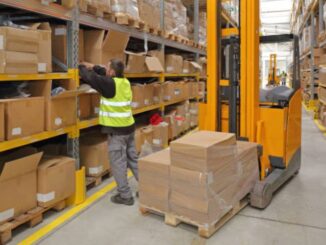 warehouse worker busy with packages