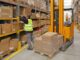 warehouse worker busy with packages
