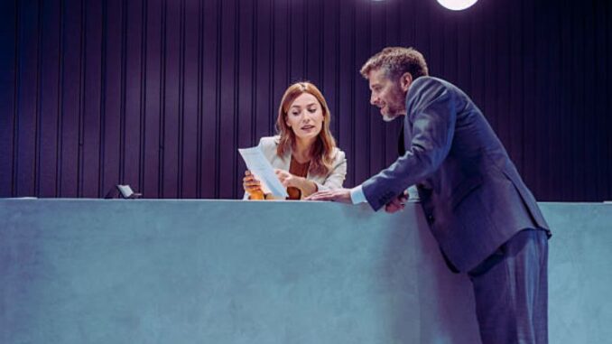 woman working as a front desk agent